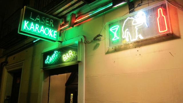 The neon signs outside Laser Karaoke, Calle de las huertas, Madrid